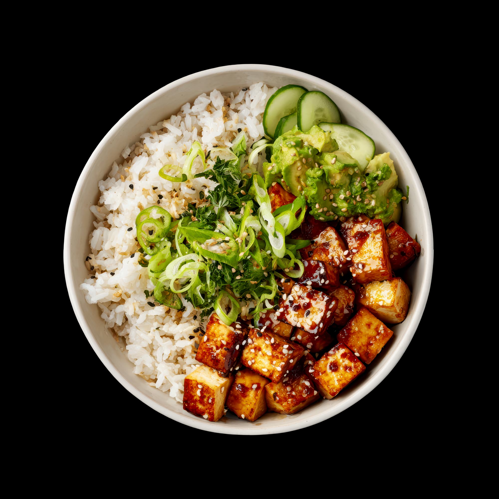 A Food City bowl of glazed tofu, steamed rice, avocado, cucumber and spring onion