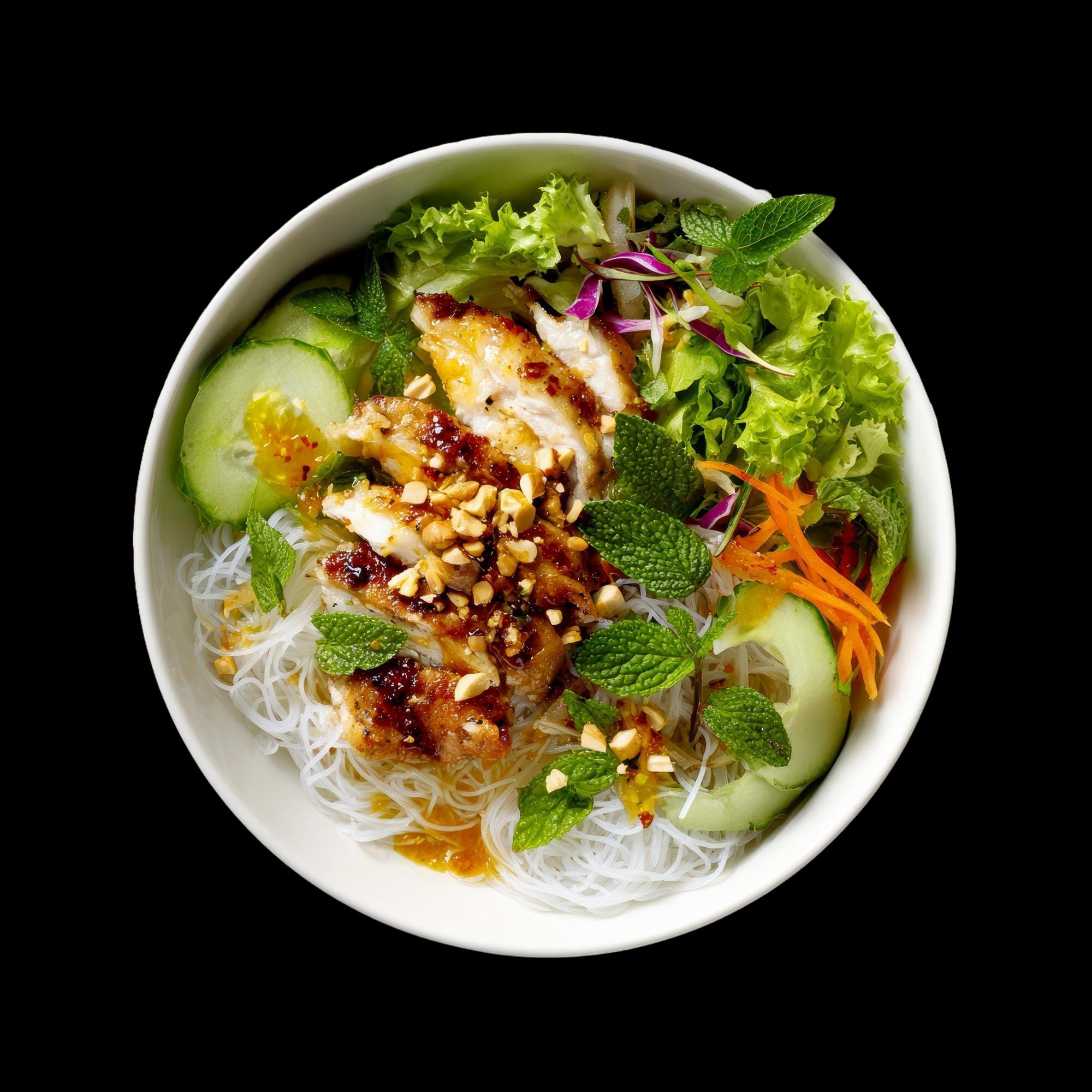A Food City bowl of grilled chicken, rice noodles, fresh greens and herbs